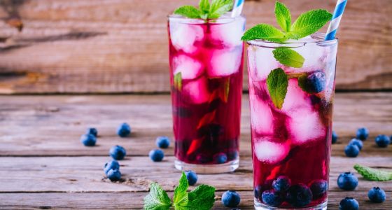 Blueberry,Ice,Sangria,With,Mint,In,Glasses,On,Wooden,Background
