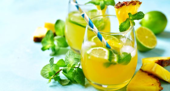 Homemade,Summer,Lemonade,With,Pineapple,,Orange,And,Lime,In,A