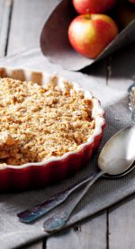 Apple,Crumble,On,The,Wooden,Background,With,Apples,.