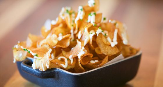 House,Cut,Potato,Chips,Fried,Until,Light,And,Crispy.,They're