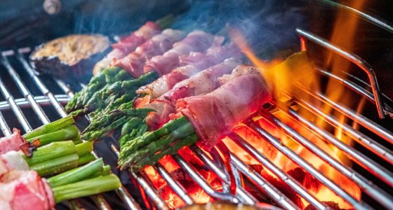 Bacon Wrapped,Asparagus,Cooks,Beautifully,On,The,Grill,,Releasing,Savory,Scents