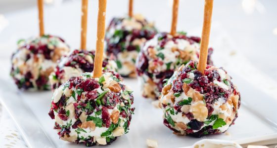 Christmas,Cheese,Ball,Appetizers,With,Cranberries,,Pecans,And,Herbs.