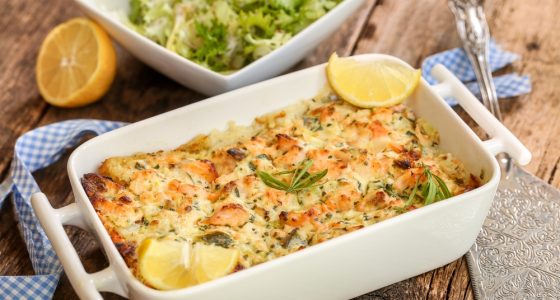 Delicous,Salmon,Parmentier,With,Salad,On,Wooden,Table