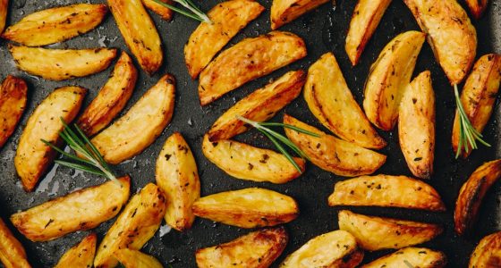 Roasted,Potatoes.,Baked,Potato,Wedges,With,Rosemary,And,Olive,Oil.