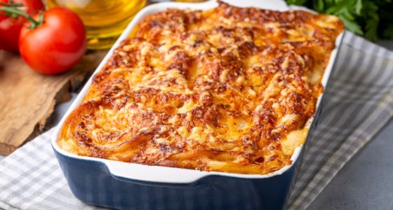 Pasta,Casserole,Bechamel,Sauce,Topped,With,Melted,Mozzarella,Cheese,And